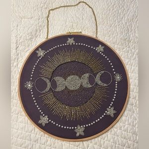Phases of the moon wall hanging